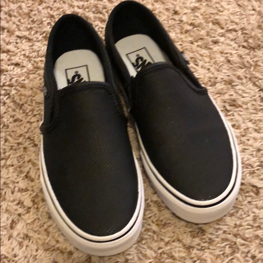 Black Vans slip on sneaks